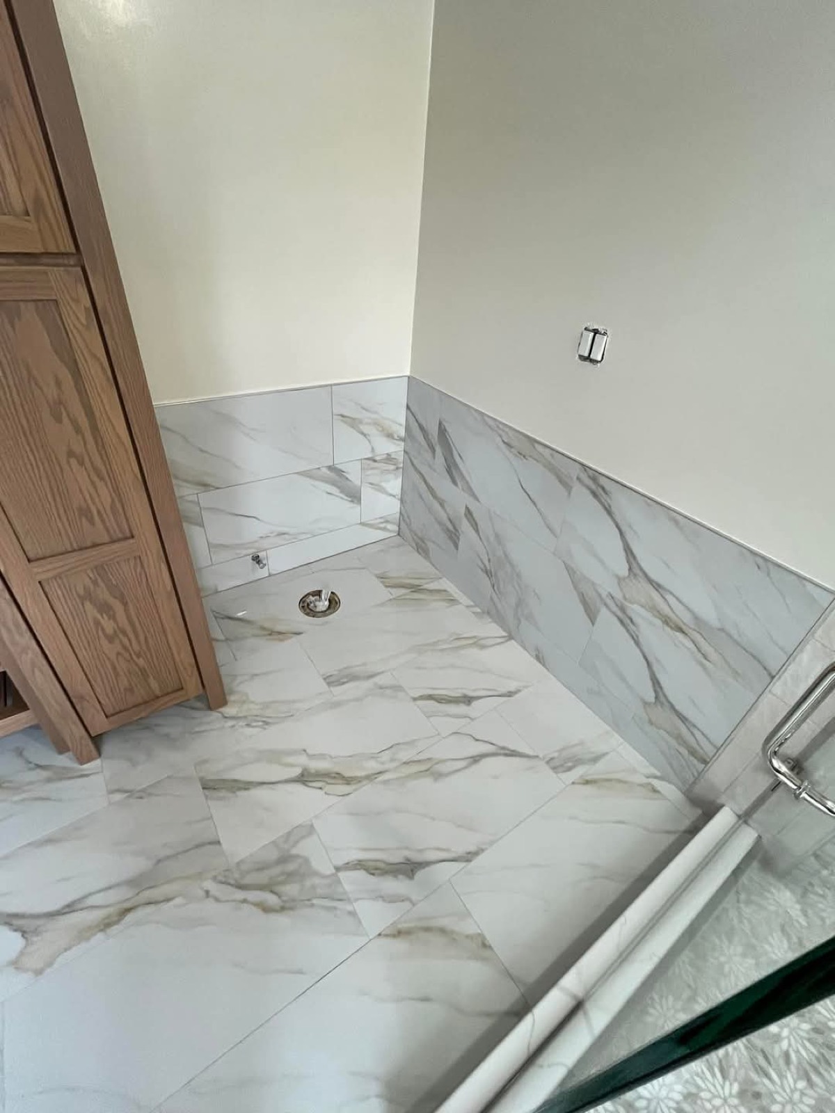 Marble tile floor with matching wainscot